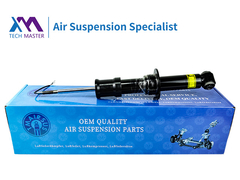 Teknisi Master Cadillac Escalade Shock Absorber Belakang Selesai